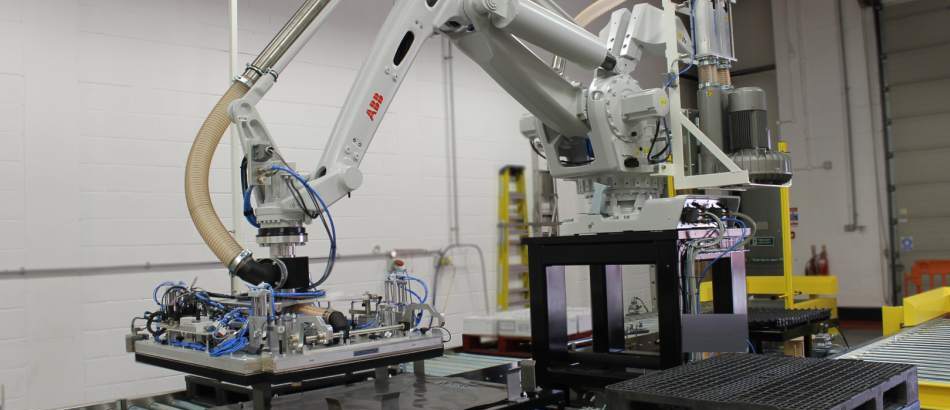 Robot palletiser head redesign provides a quick solution for a food manufacturing plant saving resource and energy costs