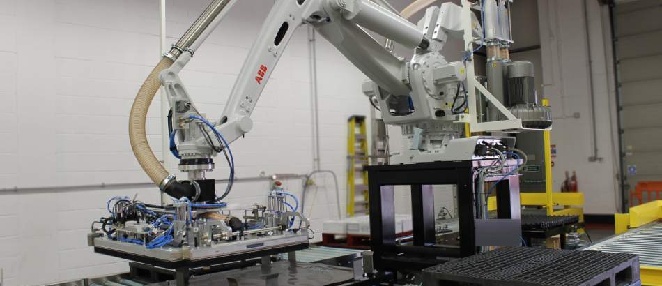 Robot palletiser head redesign provides a quick solution for a food manufacturing plant saving resource and energy costs
